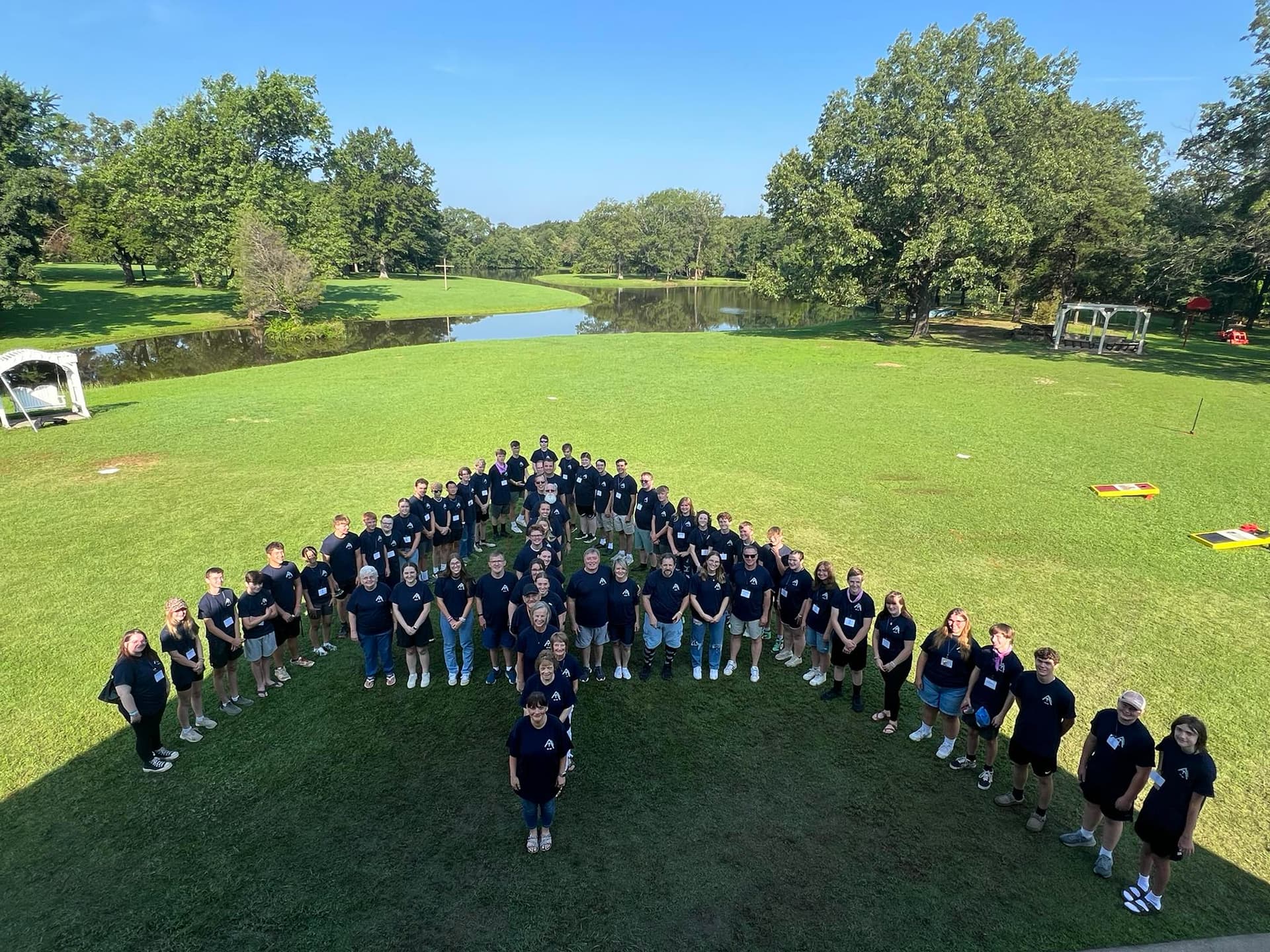 Senior High Week 2025 campers in heart formation